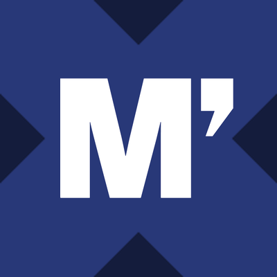 MCOx logo — tokenized Moody's stock on Solana