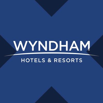 WHx logo — tokenized Wyndham Hotels & Resorts stock on Solana